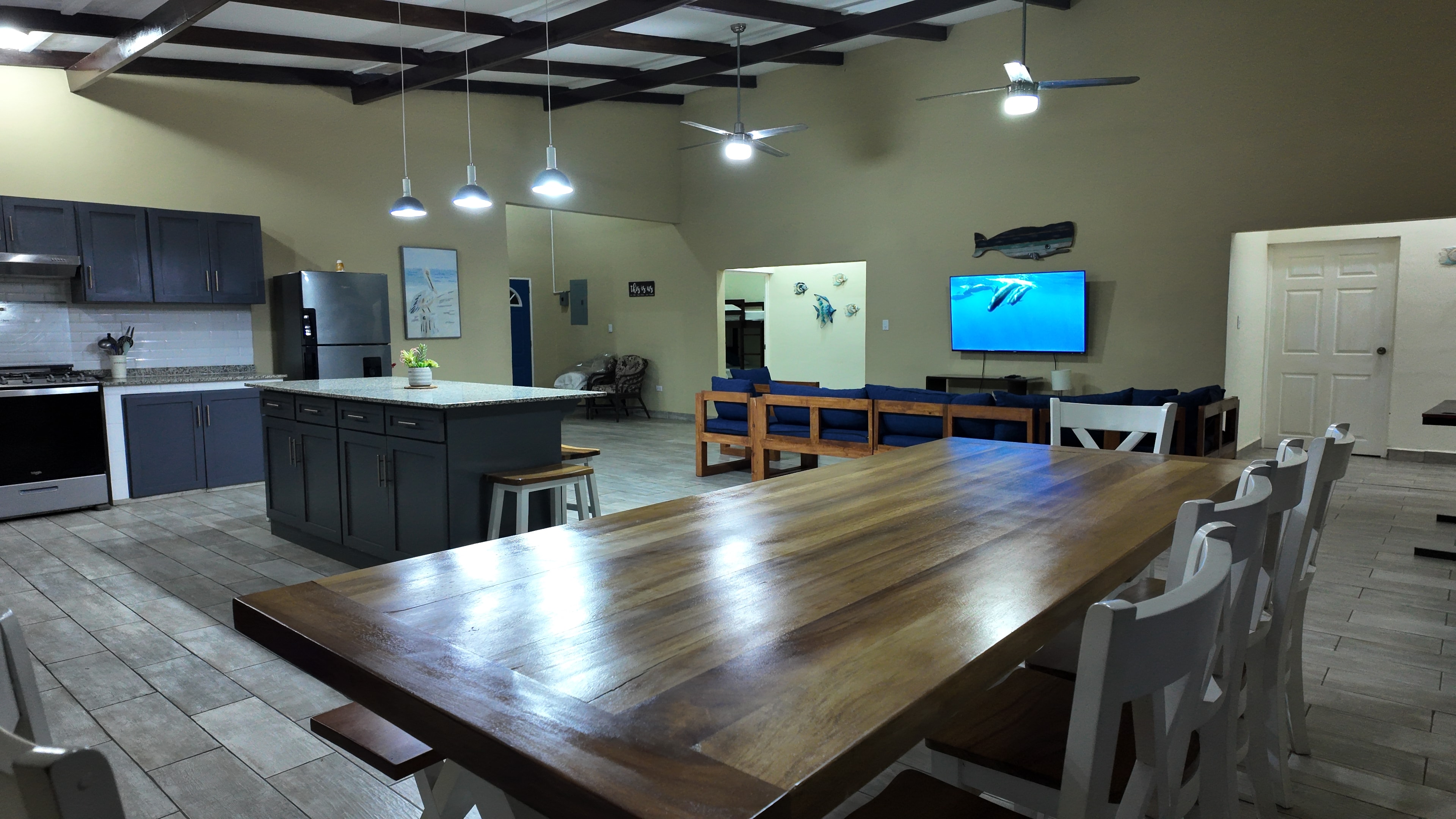 Open-concept kitchen, dining, and living area